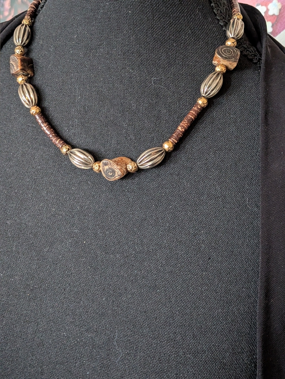 statement necklace featuring a combination of textured brown wood Metal Beads